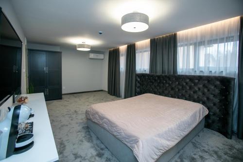 Ένα ή περισσότερα κρεβάτια σε δωμάτιο στο B&D Apartments Delux, NEW