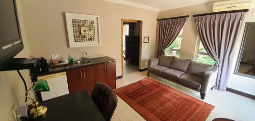 Zona de estar de Acacia Lodge