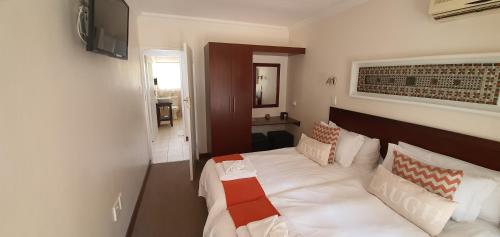 Cama o camas de una habitación en Acacia Lodge
