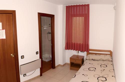 Katil atau katil-katil dalam bilik di Hostal Fontdemora