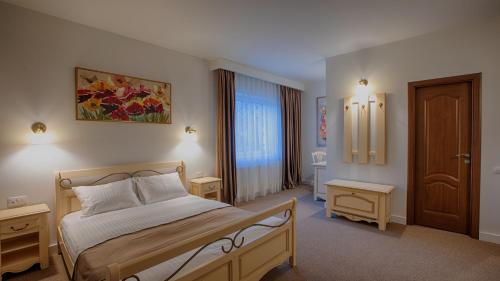 Postel nebo postele na pokoji v ubytování MER Guest House B&B