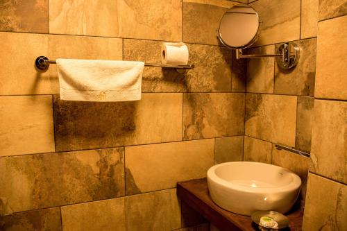 Salle de bains dans l'établissement Havana Resort