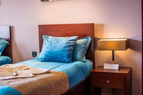 Un ou plusieurs lits dans un hébergement de l'établissement Havana Resort