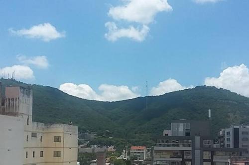 a view of a city with mountains in the background at EN EL CORAZON DE SALTA PASADO PRESENTE Y FUTURO in Salta