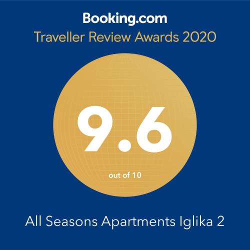 a yellow circle with the text travel review awards and all seasons appointments jataka at All Seasons Apartments Iglika 2 in Borovets