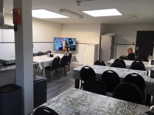 Televisyen dan/atau pusat hiburan di Pension Moerdijk