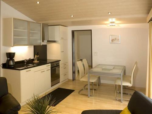 Apartment Saphir Diamond by Interhomeにあるキッチンまたは簡易キッチン