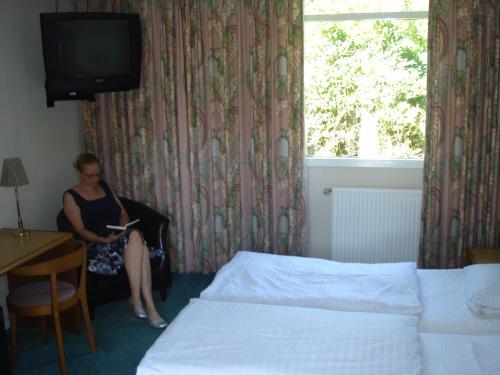 En eller flere senge i et værelse på St. Binderup Kro