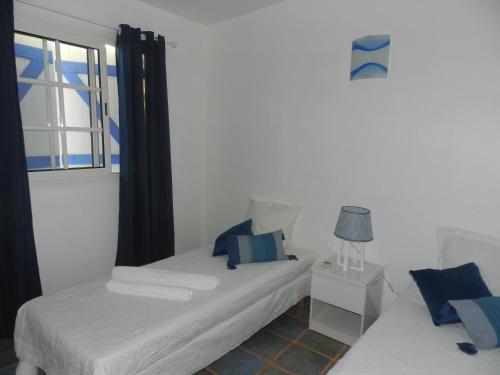 Postel nebo postele na pokoji v ubytování VILLA LE BORD BLEU