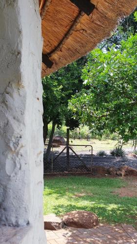 a view of a park with a gate and trees at Haggards on Hilldrop in Newcastle