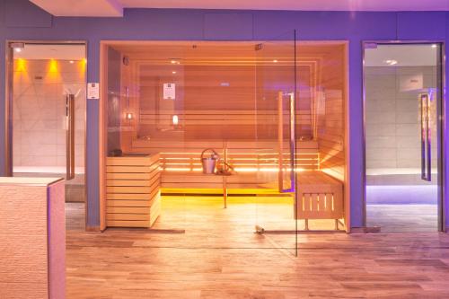 a sauna with a shower in a room at Centro Turistico Akiris in Nova Siri Marina