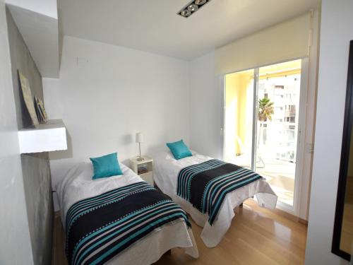 Cama o camas de una habitación en Apartamento Golden Gate Javea