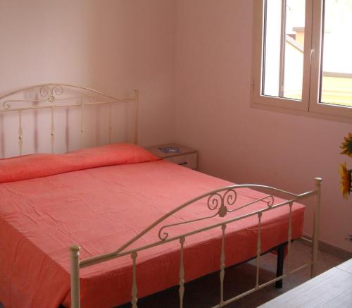 Ein Bett oder Betten in einem Zimmer der Unterkunft Case Vacanza IonianTravel Gallipoli