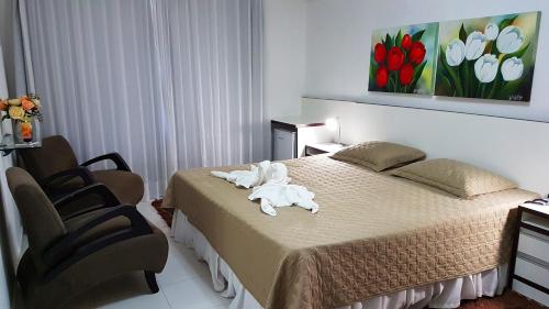 Postel nebo postele na pokoji v ubytování Hotel Termas Gravatal