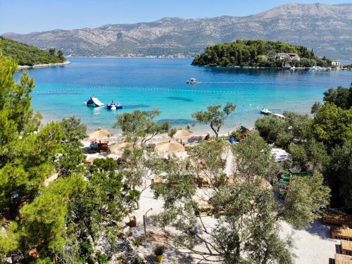 a view of a beach with boats in the water at Korcula Hill in Korčula