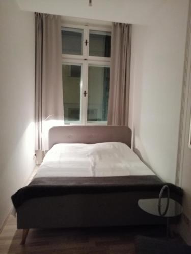 Ліжко або ліжка в номері Wohnung im historischen Altbau von 1899