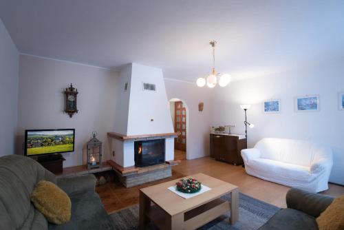 A television and/or entertainment centre at Chalupa U Miška