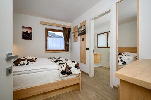 Krevet ili kreveti u jedinici u objektu B&B B&Beautyfol Dolomites adults only