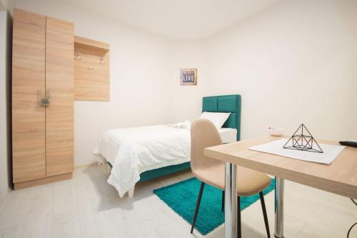 Cama o camas de una habitación en Cvetni trg