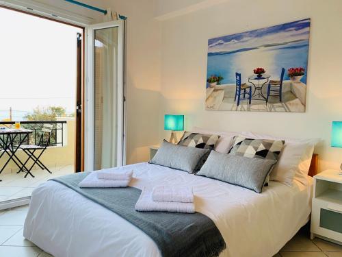 Кровать или кровати в номере Villa Serendipity Sea View