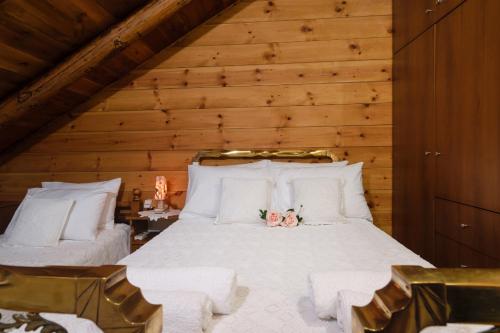 Llit o llits en una habitació de Dimitris's Country House