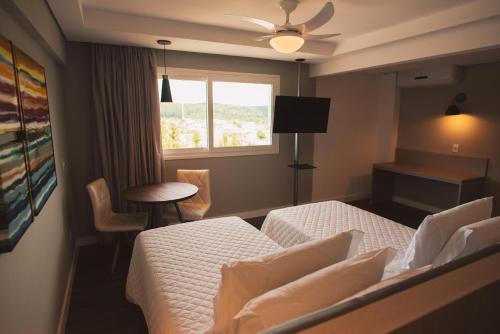 Televisyen dan/atau pusat hiburan di Hotel Renar