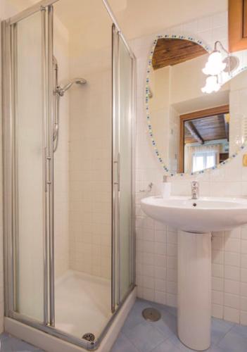 a bathroom with a shower and a sink at Le 8 campane 2 in Salerno