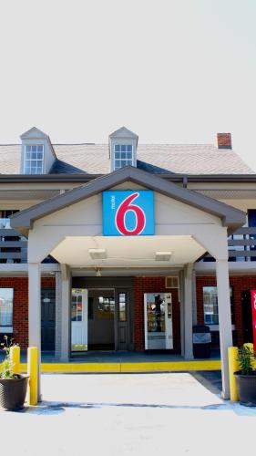 a gas station with a sign on it at Motel 6-Dayton, OH in Dayton