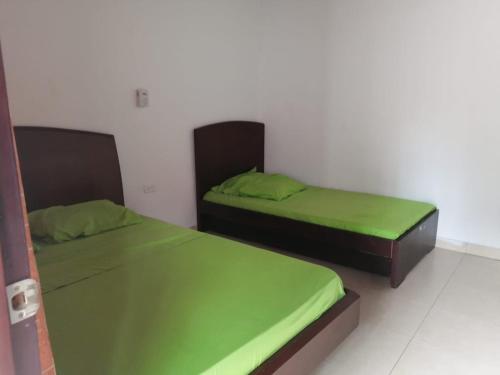 Postel nebo postele na pokoji v ubytování Hotel Mar y Luna