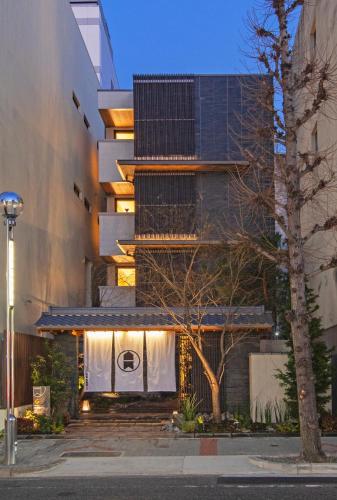 a building with lights on the side of it at GRAND BASE Osu in Nagoya