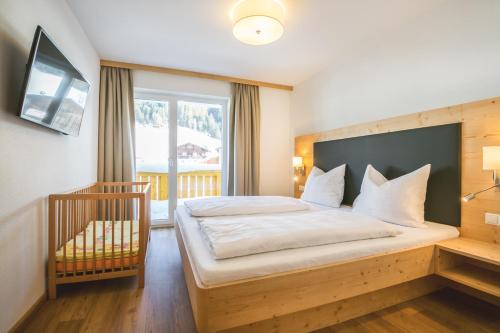 Кровать или кровати в номере Appartement Botenwirt