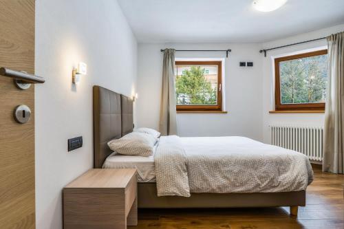 Postel nebo postele na pokoji v ubytování Il Mondo di Patty 4