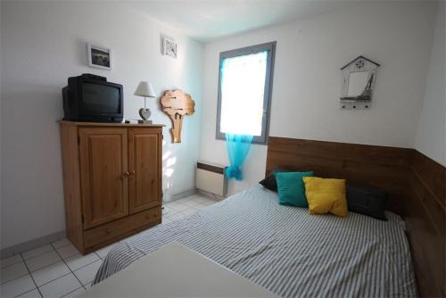 300m de la plage, adorable maison sud 2 chambres 5 couchages terrasse ombragée parking LRHP14