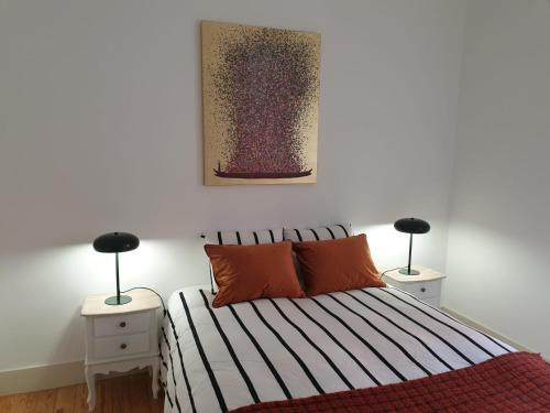 Łóżko lub łóżka w pokoju w obiekcie Stay Home Lisbon