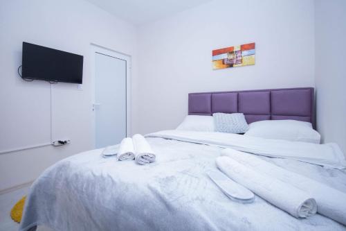Cama o camas de una habitación en Cvetni trg