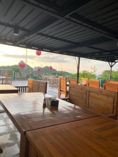 Balkón nebo terasa v ubytování Pesona bali Room and restaurant