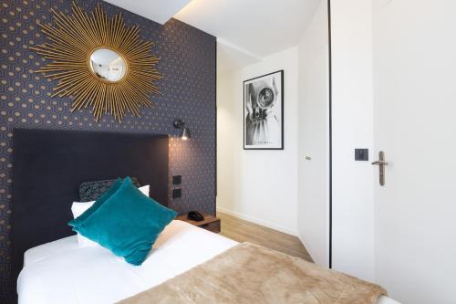 מיטה או מיטות בחדר ב-Hotel OHM by Happyculture