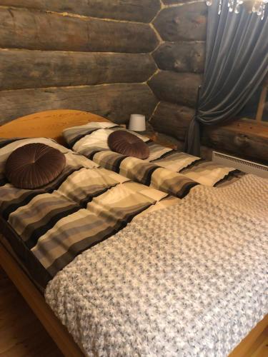 Кровать или кровати в номере Villa Karhuntähti