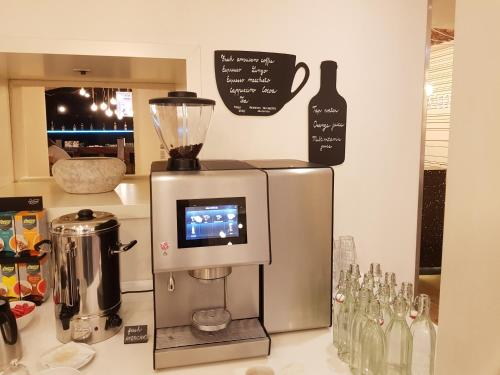 Cuisine ou kitchenette dans l'établissement Pure White