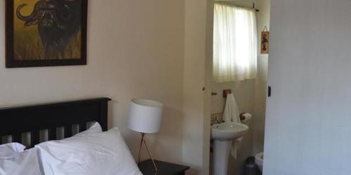 Postel nebo postele na pokoji v ubytování Siesta B&B Vryheid