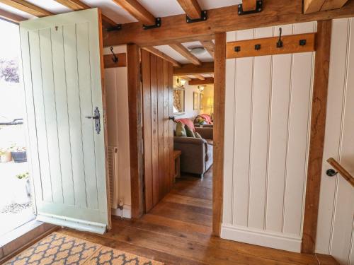 a hallway with white doors in a house at The Milk House in Wirksworth