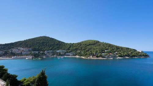 an island in the middle of a large body of water at Hotel Komodor in Dubrovnik