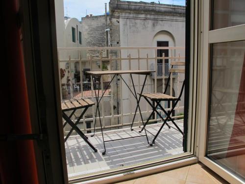 Un balcón o terraza de casa vacanze DOMUS CENTRALE
