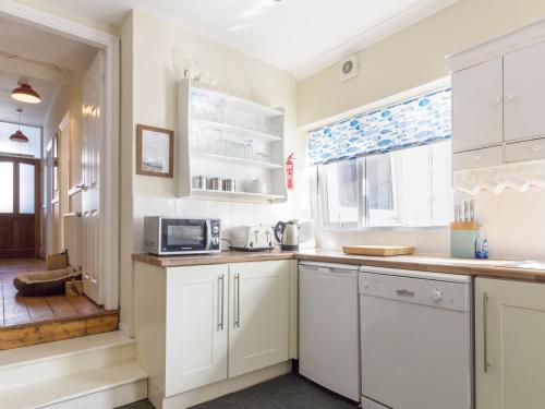 Dapur atau dapur kecil di Beachgetaway