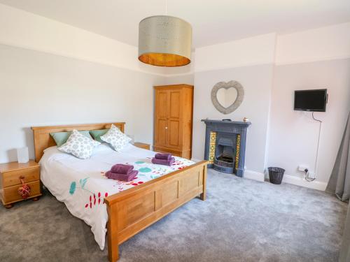 Ένα ή περισσότερα κρεβάτια σε δωμάτιο στο The Northgate Loft