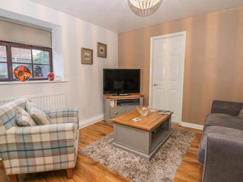 Μια τηλεόραση ή/και κέντρο ψυχαγωγίας στο Glebe Hall Apartment
