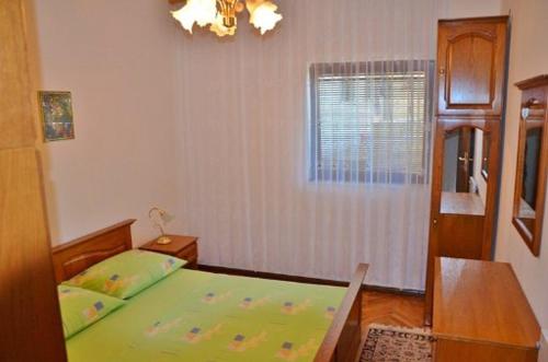 Postel nebo postele na pokoji v ubytování Apartment Knez