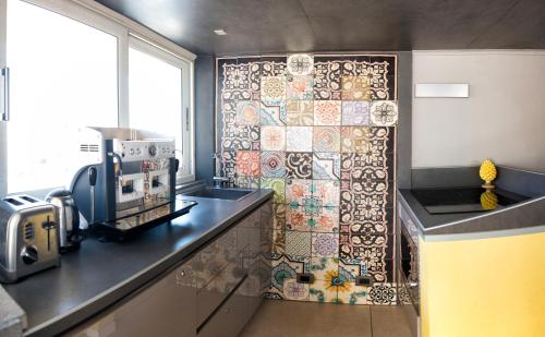 Kuchyň nebo kuchyňský kout v ubytování Casa Turrisi