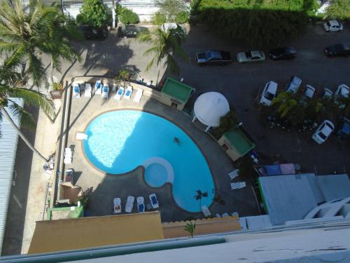 an overhead view of a swimming pool at a resort at Condopatong in Patong Beach