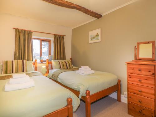 Katil atau katil-katil dalam bilik di Low Garth Cottage